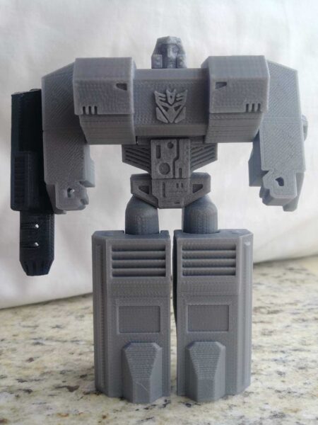 Dönüşümlü Megatron (Tek Baskı, Destek Malzemesi Yok) Plastik Aparat